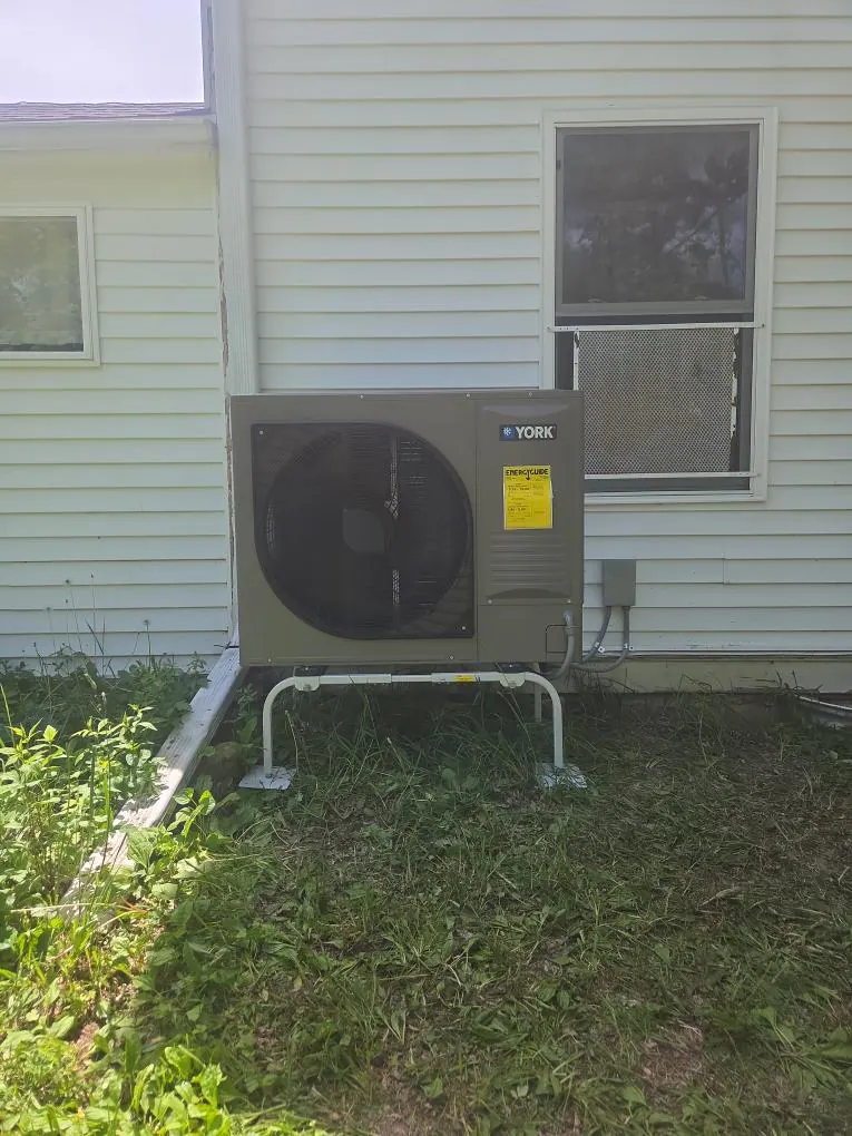 AFTER: New outdoor air conditioning unit installed in Elkhorn — by Cody & Tony, O'Leary Plumbing, Heating & Electrical.