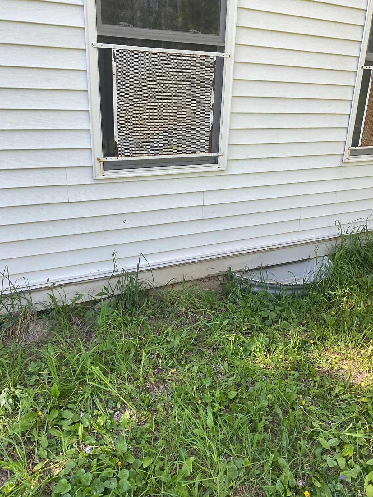 BEFORE: Old outdoor air conditioning unit removed for an Install A/C unit job in Elkhorn — by Cody & Tony, O'Leary Plumbing, Heating & Electrical.