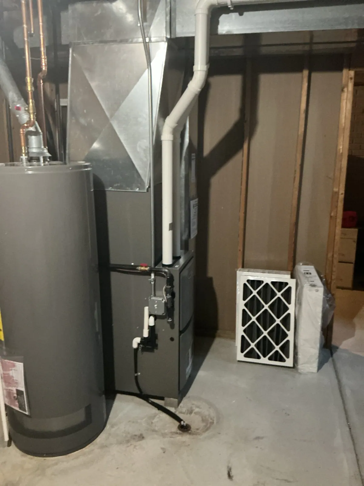 BEFORE: Utility room before water softener installation in Mukwonago — by Scott, O'Leary Plumbing, Heating & Electrical.