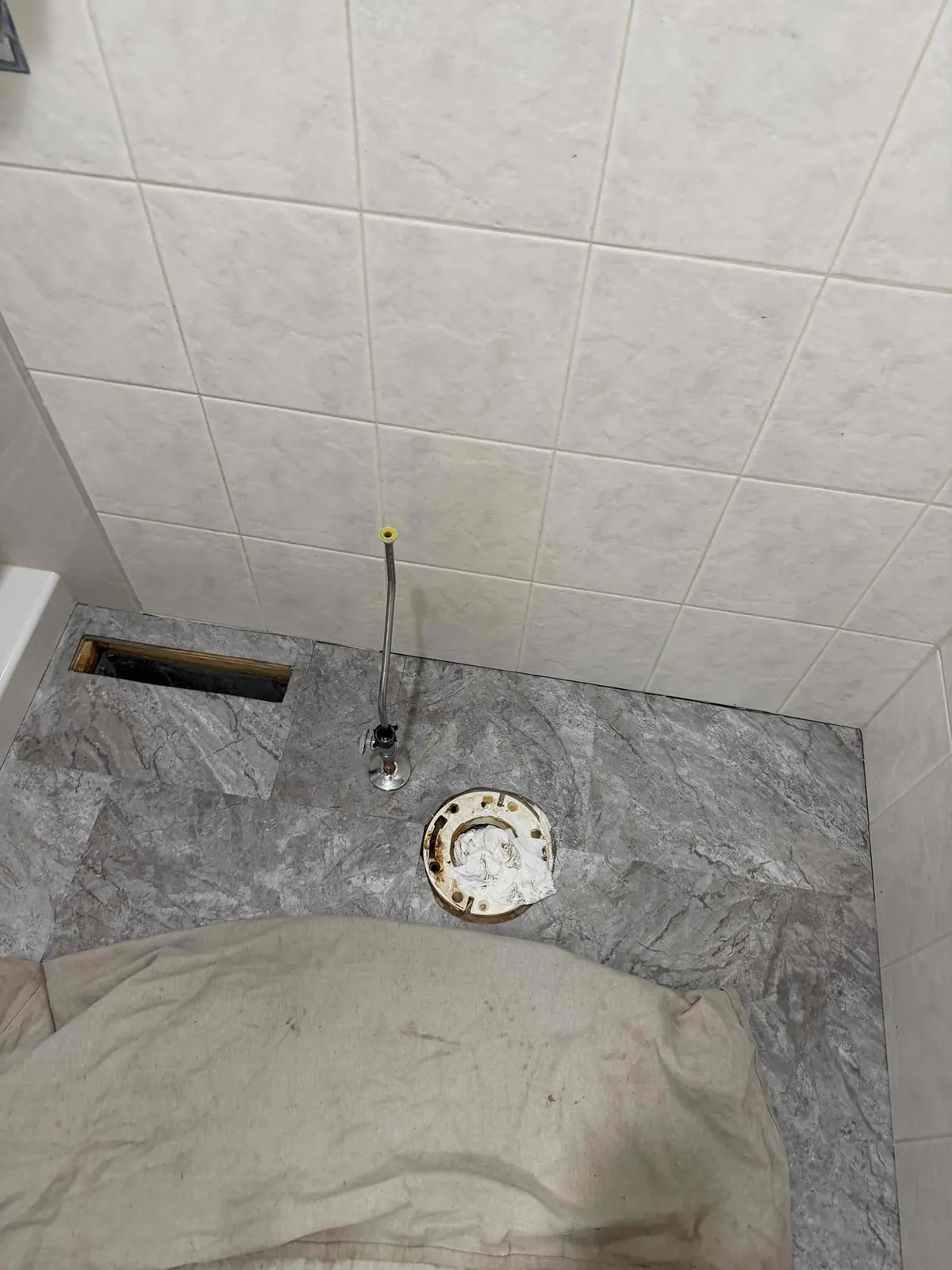 BEFORE: Bathroom rough-in prior to toilet install in East Troy — by Jake, O'Leary Plumbing, Heating & Electrical.