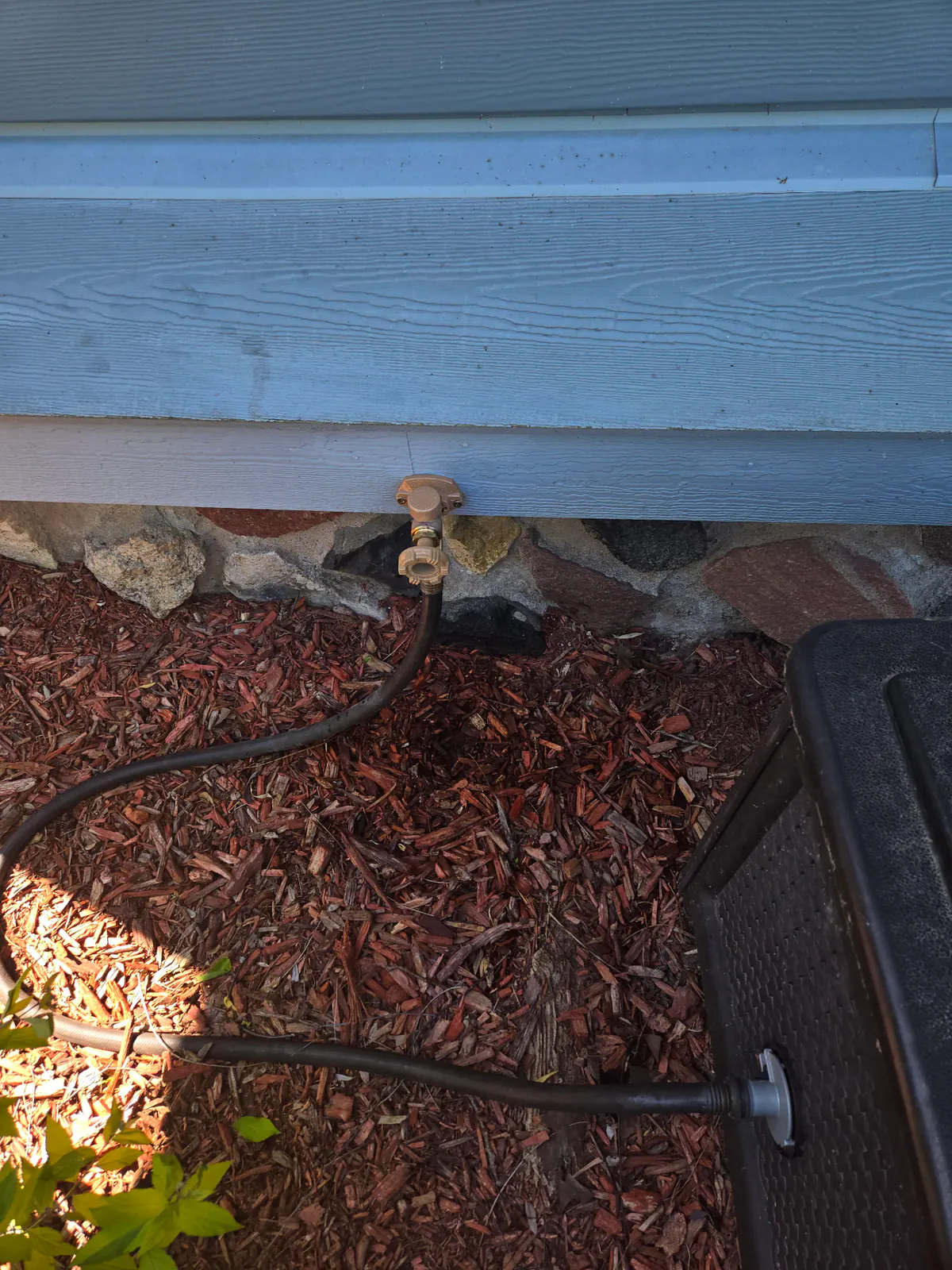 AFTER: New replacement hose bibb installed at a home in East Troy — by Jacob, O'Leary Plumbing, Heating & Electrical.