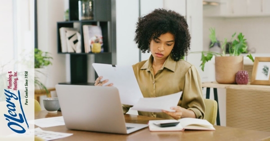 woman reviewing monthly bills