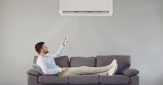 man using AC system